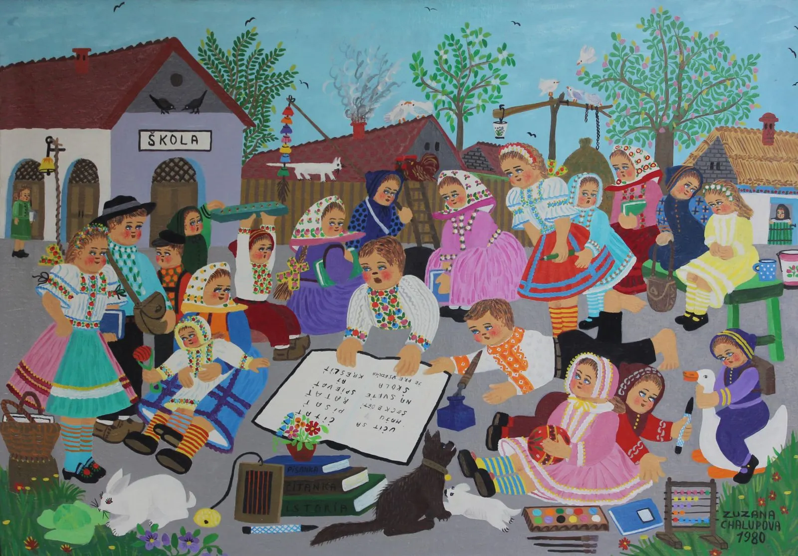 Čas u prirodi, a naive-art painting by Serbian-Slovak painter Zuzana Chalupová, showing a group of children in traditional folk costume reading and playing together outside a village school.